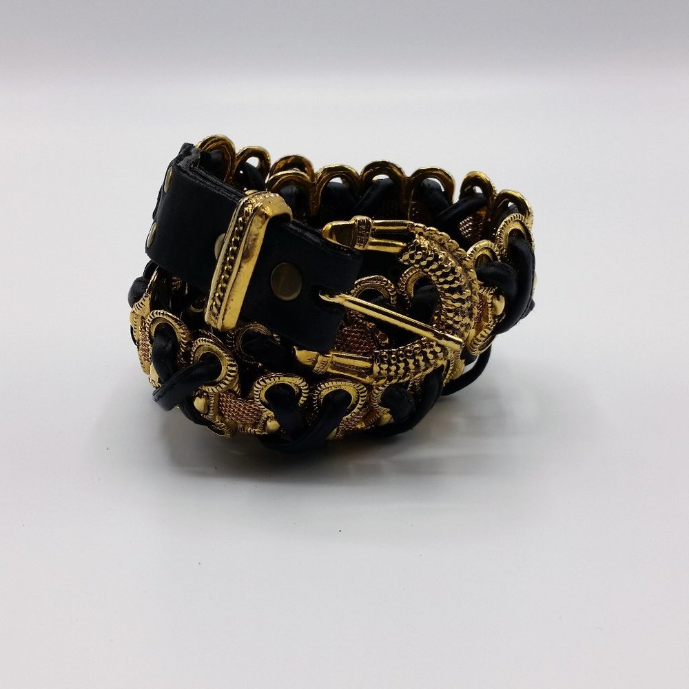 Studded black and gold leather belt